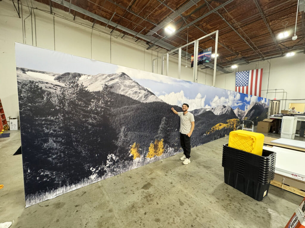 Custom dye-sublimated fabric graphic of mountain range for trade show booth in Orlando